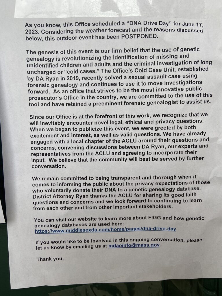 A noticed posted at the entrance of the War Memorial at Newton City Hall explains the postponement of the DNA collection event.